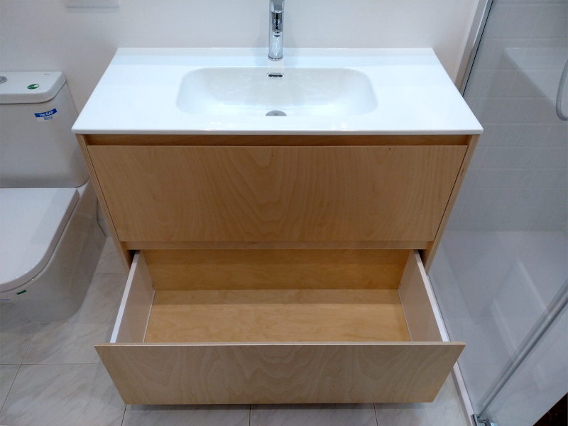 reforma baño muebles madera